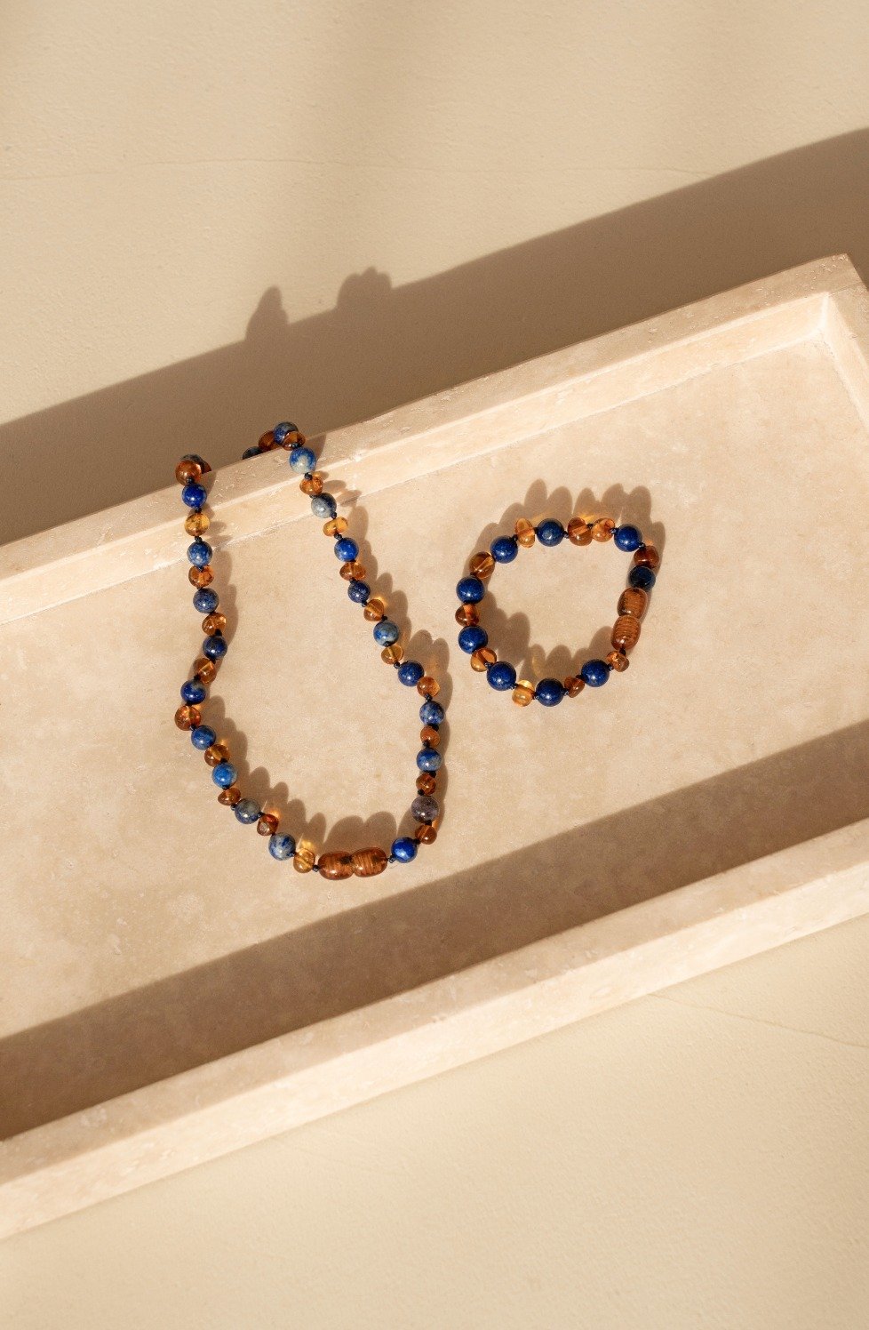 Barnsteen ketting donkerblauw baby