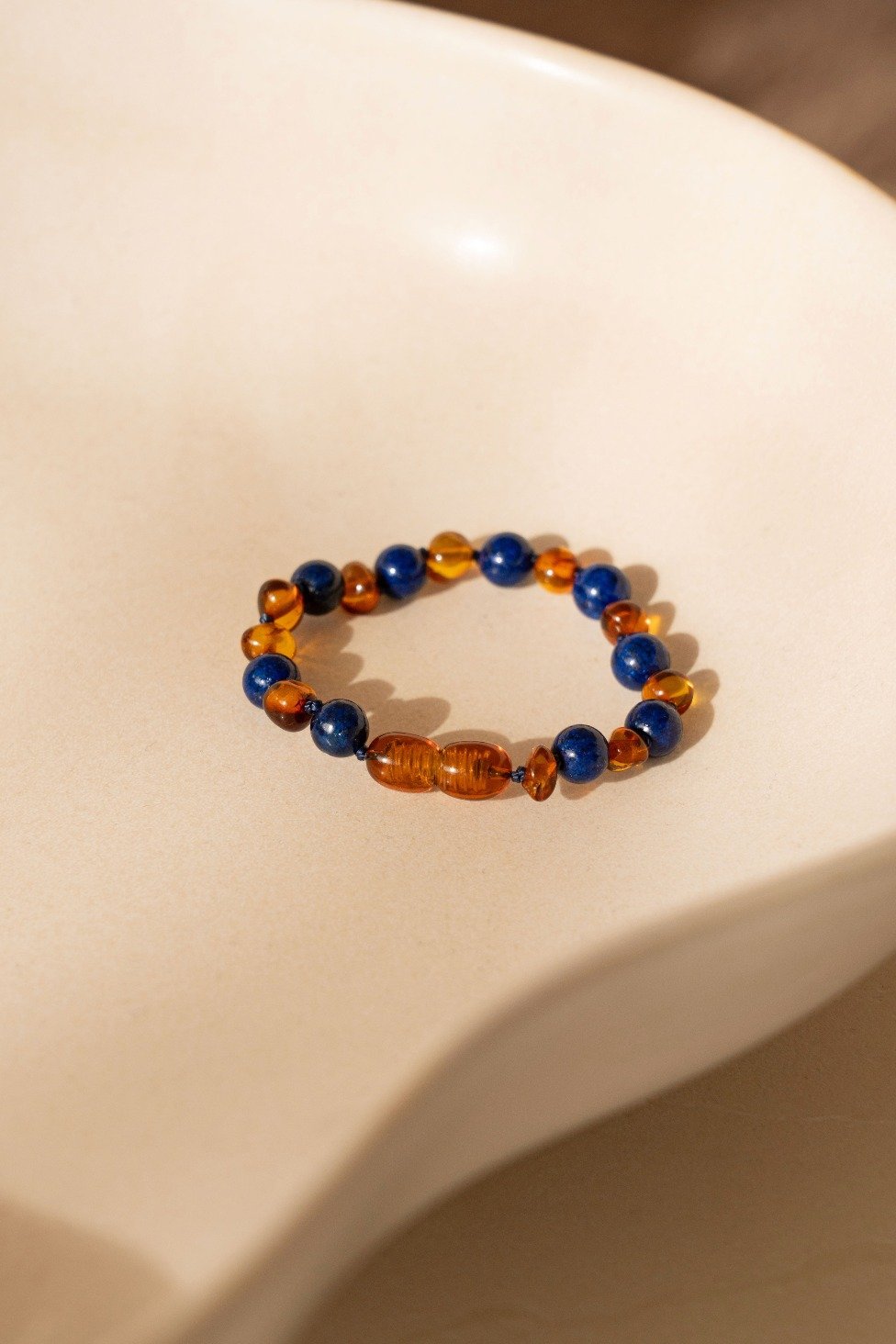 Barnsteen armband donkerblauw baby